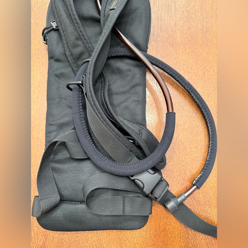 DADS ESTATE SALE: Never used Camelbak with bladder, about 17” x 7”. - Picture 5 of 5